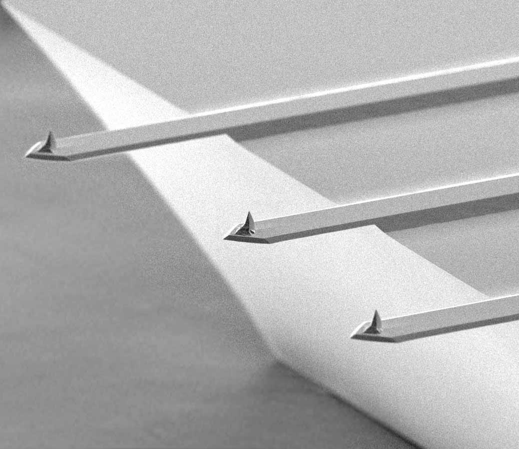 SEM image of rectangular silicon AFM cantilever and AFM probe.